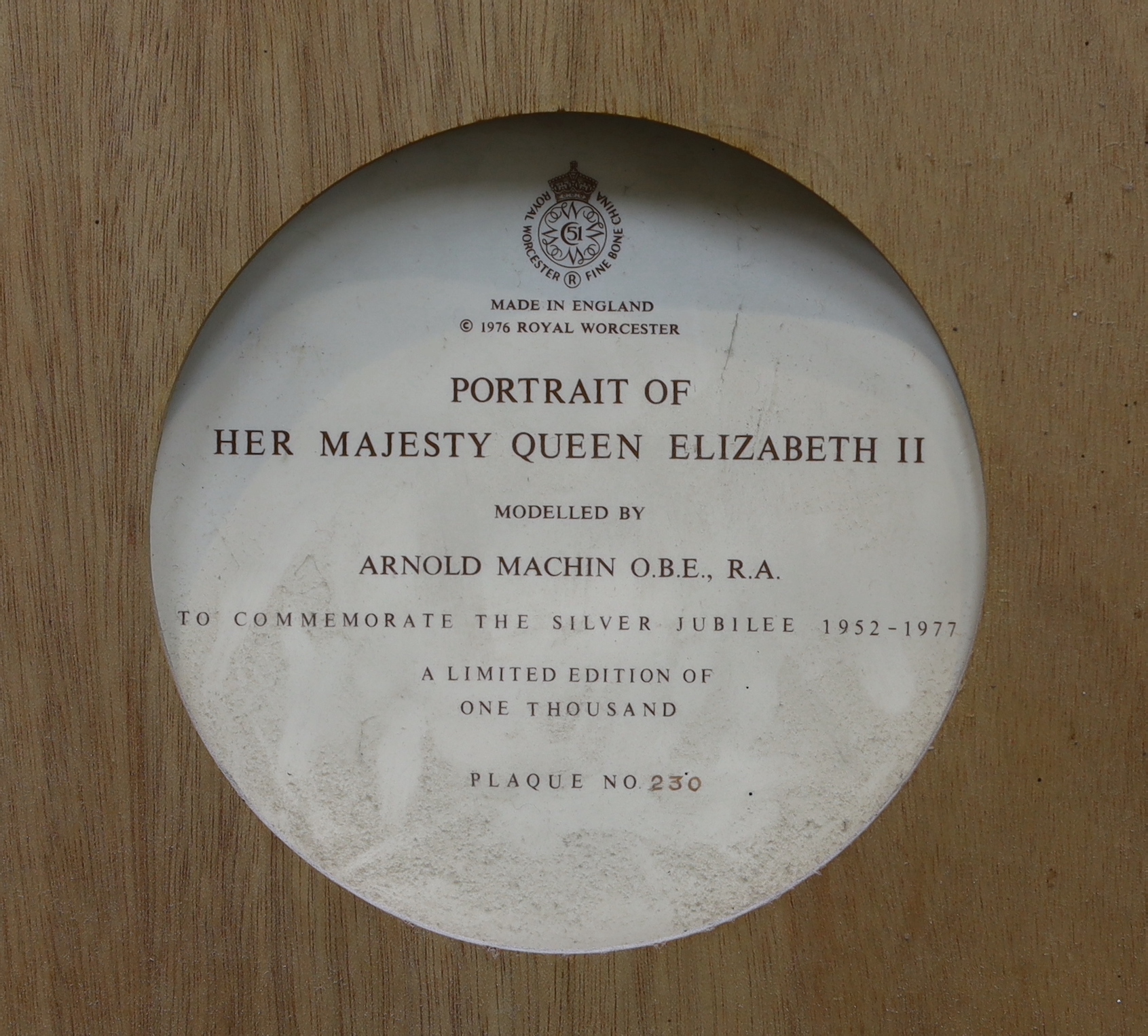 Arnold Machin OBE R.A., A Royal Worcester porcelain plaque, Portrait of Her Majesty Queen Elizabeth II, number 230/1000, 33 x 21.5cm, in original hardwood frame